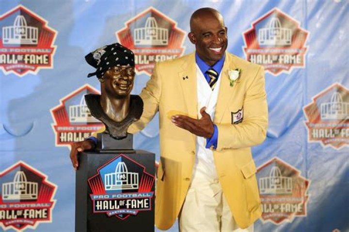 2011 Pro Football Hall of Fame Inductee Marshall Faulk Raised Over