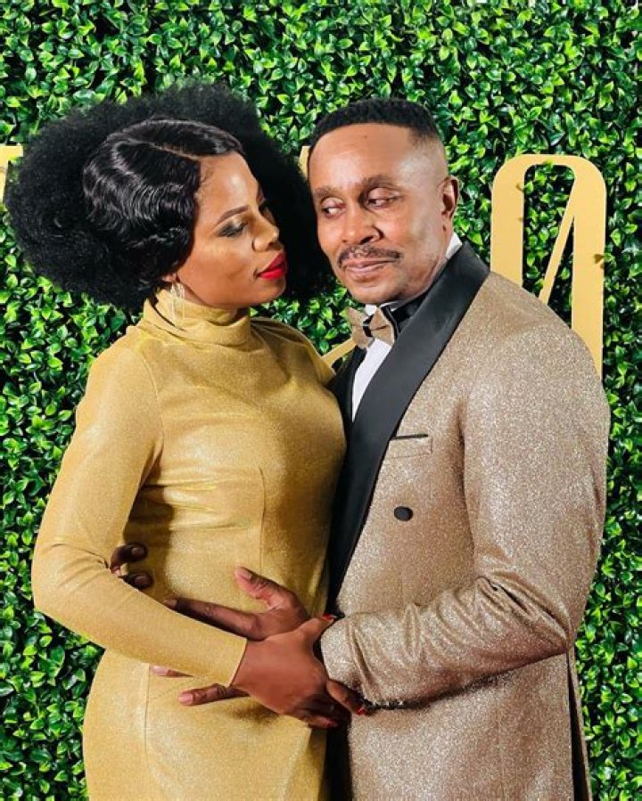 Actress Winnie Ntshaba gives her onscreen husband Vusi Kunene his flowers