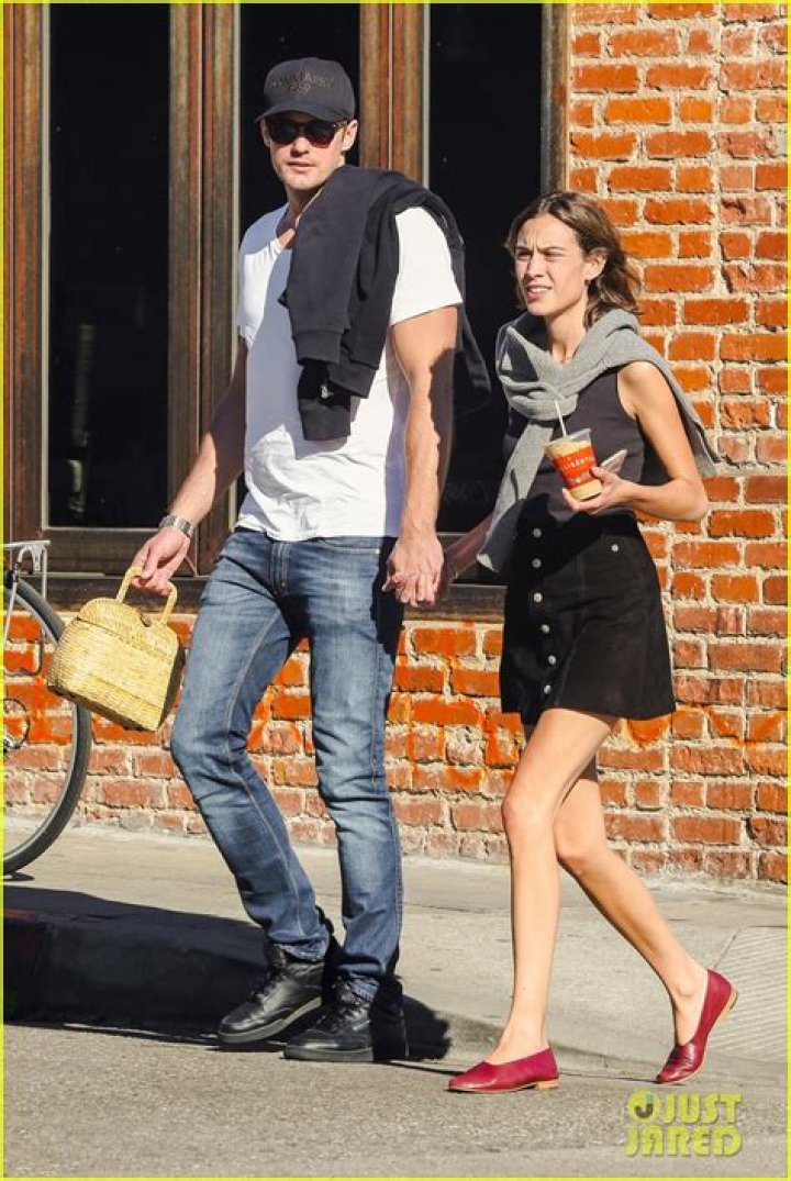 Alexander Skarsg&aring;rd and Alexa Chung Attend Glastonbury Festival