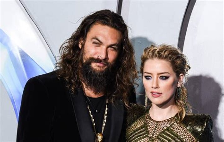 Amber Heard claimed costar Jason Momoa turned up drunk and dressed
