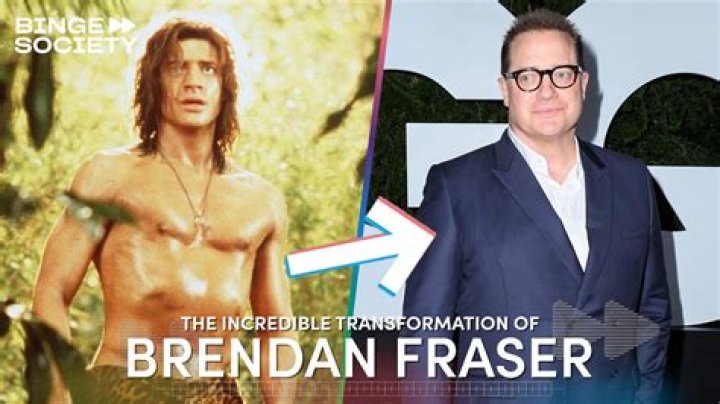 Brendan Fraser is suave in a gray suit beside his glam partner Jeanne