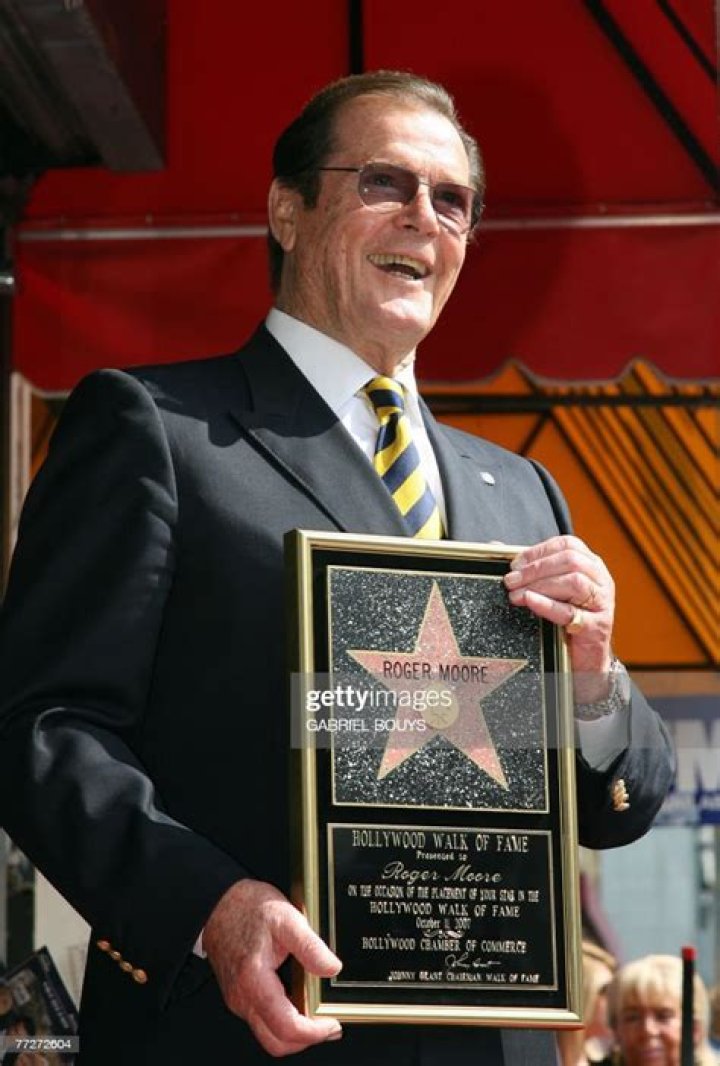 British actor Sir Roger Moore delivers a press conference in Buehl