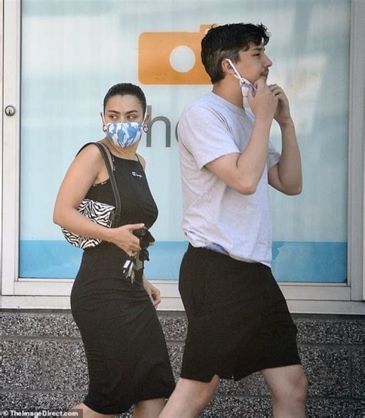 Charli XCX and boyfriend Huck Kwong step out wearing matching cloud