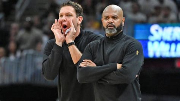 Coach Luke Walton & his son at a DFender game School social work