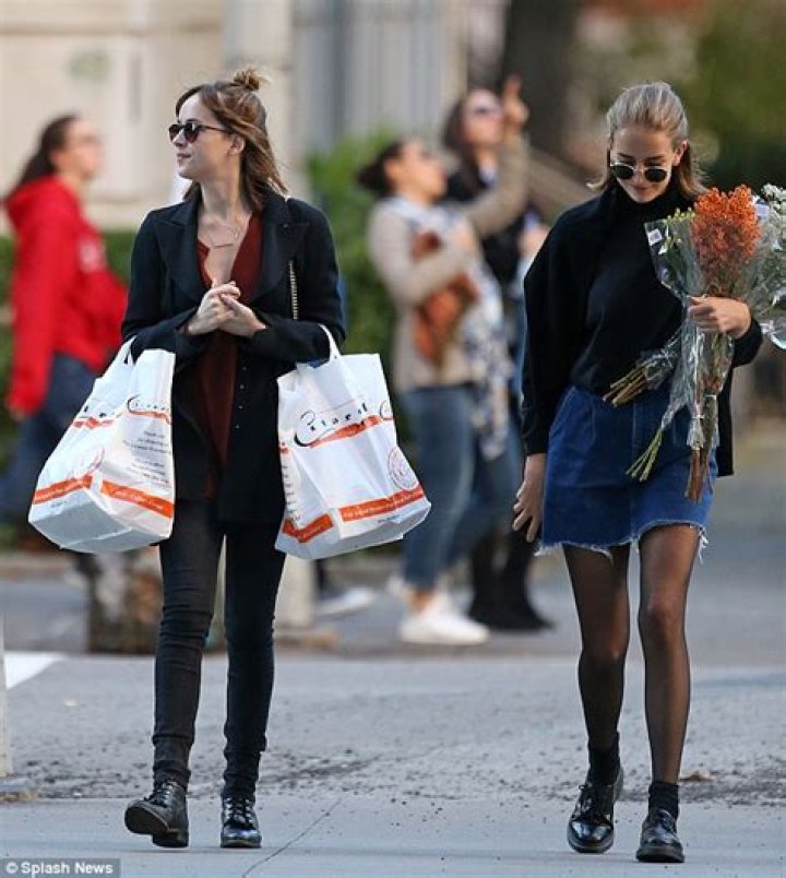 Dakota Johnson bonds with teenage sibling Grace on casual day out