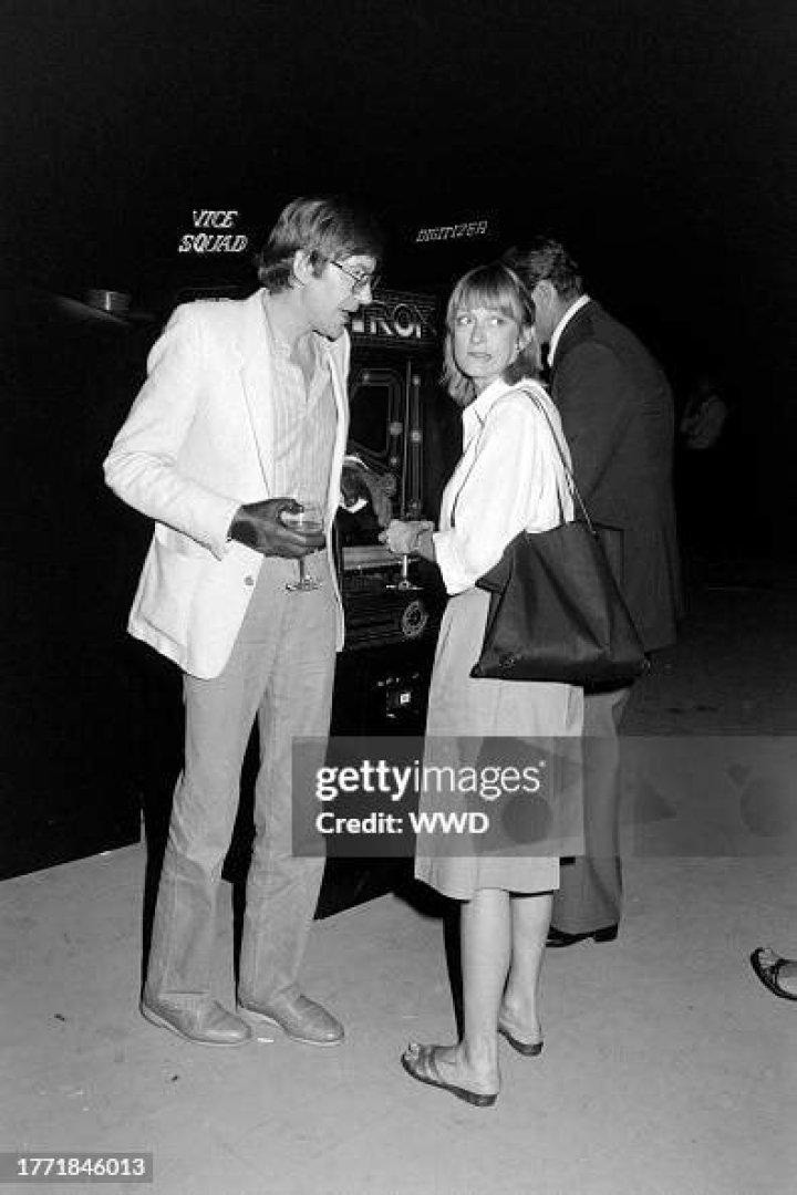 David Warner and Sheilah Kent attend a party, themed for the movie