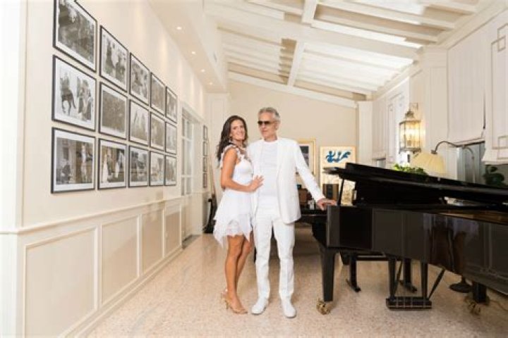Dazzling in white! Andrea Bocelli poses in rare snap with stunning wife
