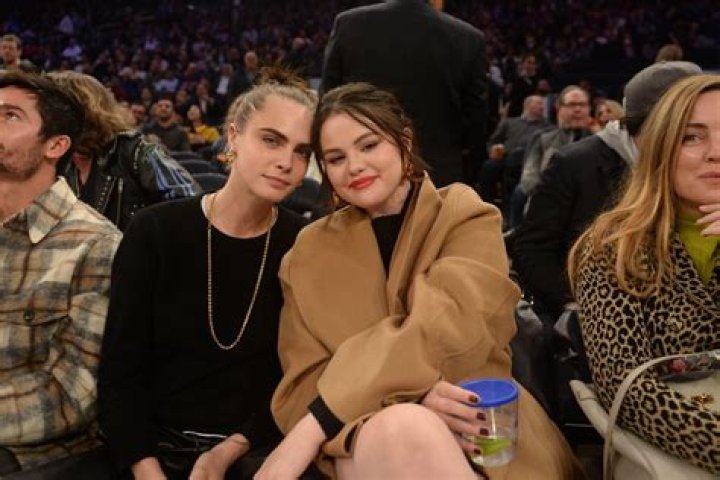 DELENA GOMEZ and CARA DELEVINGNE at Orlando Magic vs. New York Knicks
