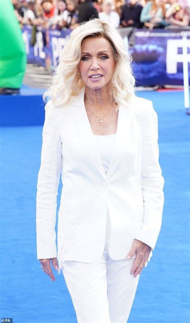 Donna Mills, 81, is dwarfed by statuesque daughter as they attends