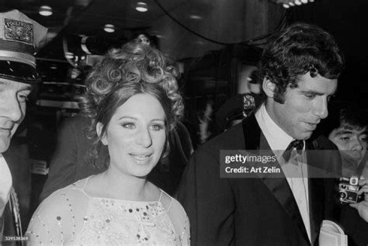 Elliott Gould and Barbra Streisand with baby Jason in early 1967