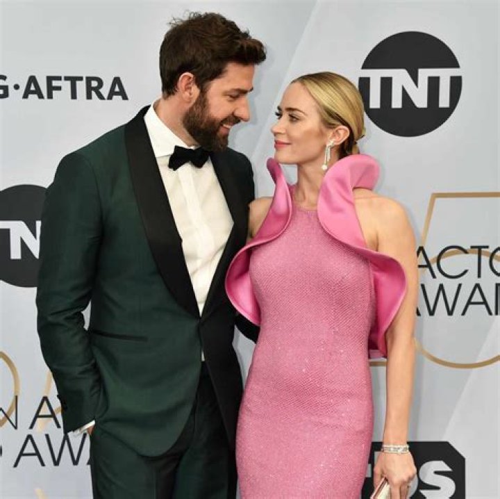 Emily Blunt and John Krasinski dote over baby Hazel on family outing