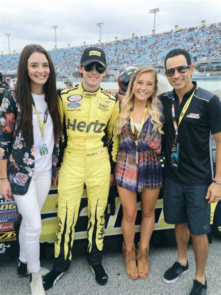 Emma, Ryan, and Erin Blaney with Helio Castroneves Helio castroneves