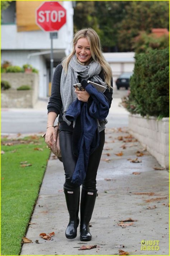 Hilary Duff wears our Hunter Original Tall in black. Rainy day outfit