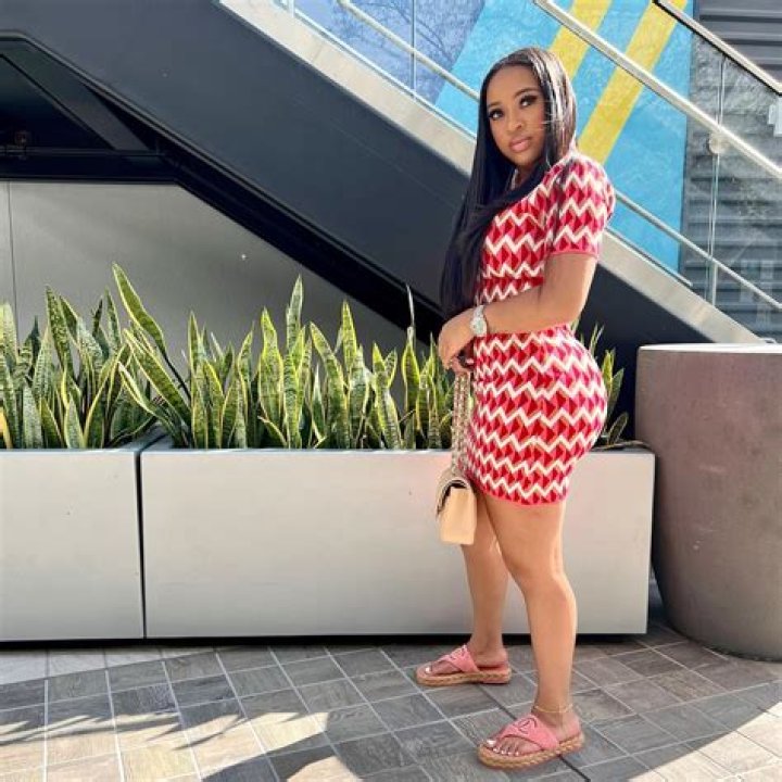 India Royale Spotted in Fashion Nova Black OffTheShoulder Jumpsuit