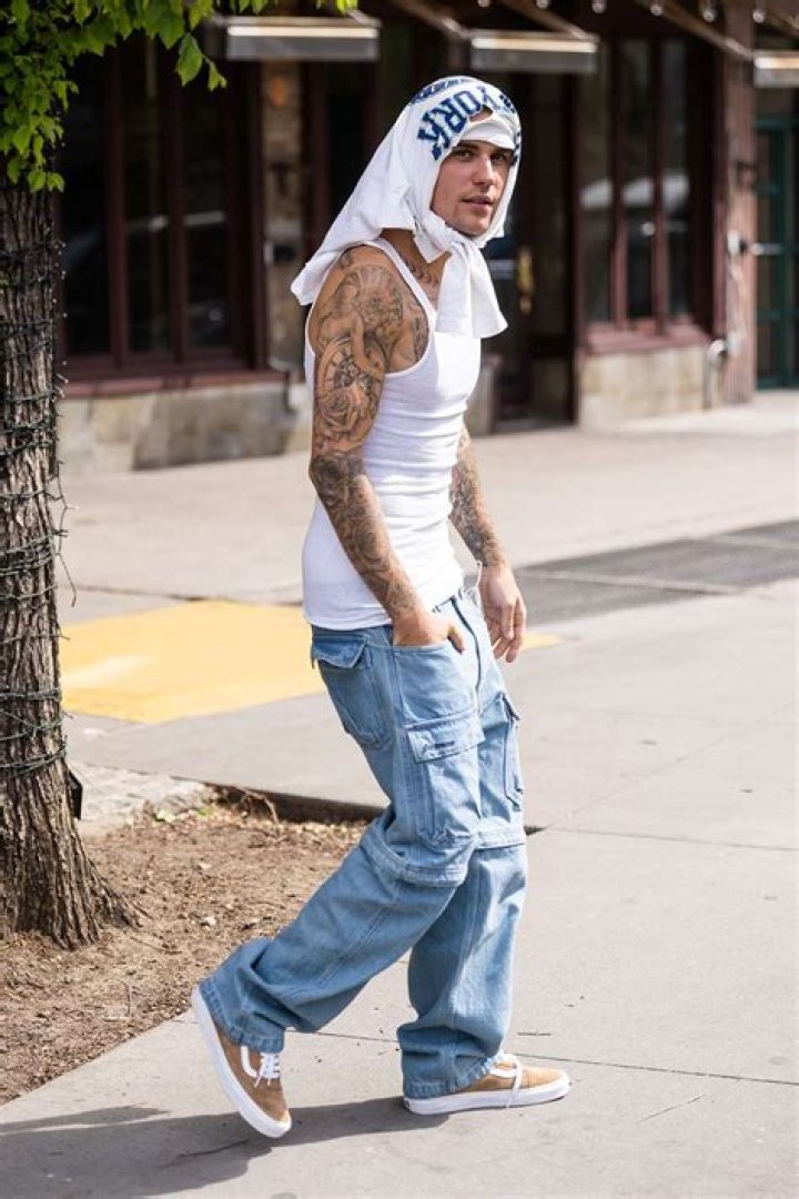 Justin Bieber Strolls Through N.Y.C. with Shirt Tied Over His Head