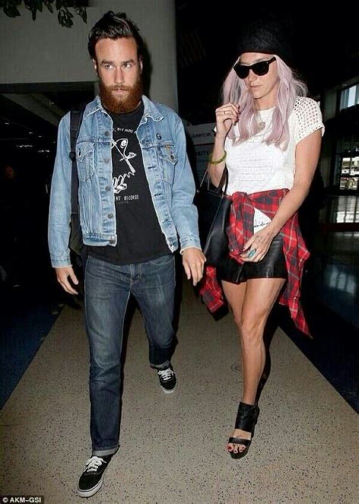 KESHA and Her Boyfriend Brad Ashenfelter at LAX Airport 12/21/2016