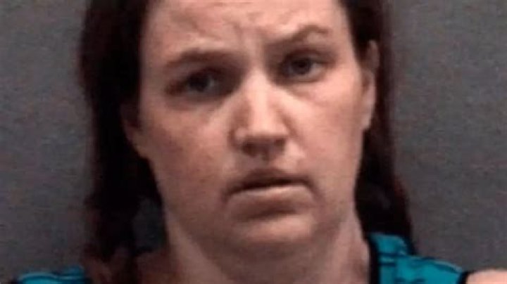 Killer mom vomits in court when she sees photos of emaciated son who