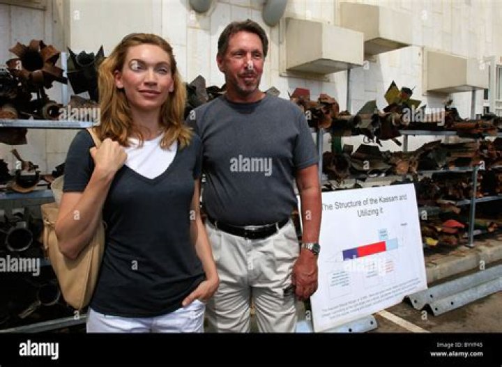 Larry Ellison and wife Melanie Craft looking at the remains of Quassam