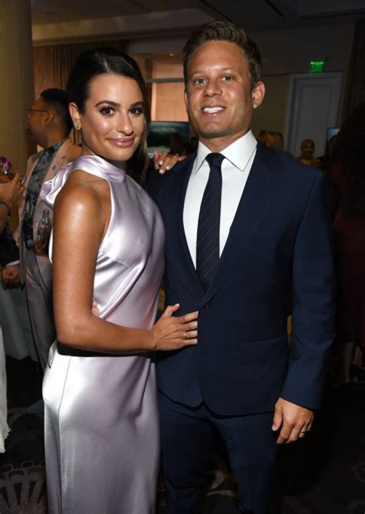 Lea Michele and Zandy Reich look thrilled in matching hoodies as they