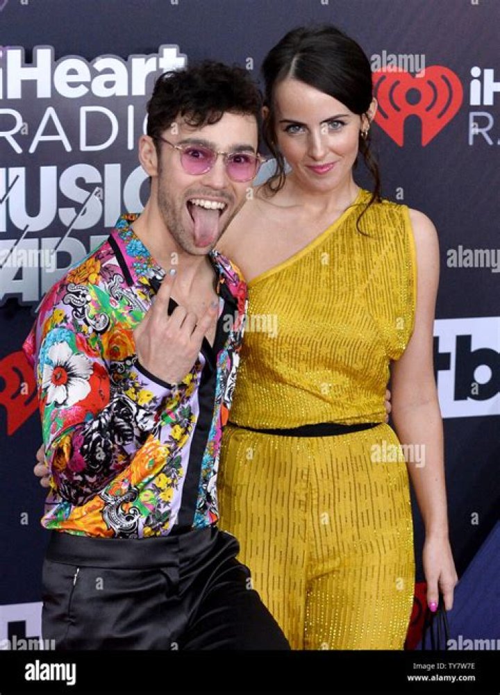 (LR) Actors MAX and Emily Schneider arrive for the iHeartRadio Music
