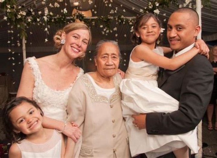 Mary Kay and Vili with their daughters on their wedding day Photos
