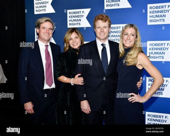 Matthew Rauch Kennedy, left, and wife Katherine Lee Manning pose with