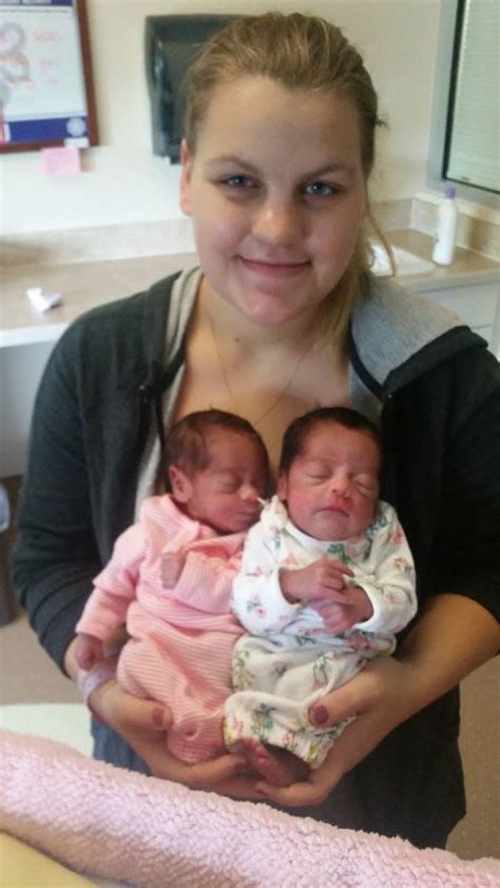 Mother allegedly forced to hold twin babies while father fatally shoots