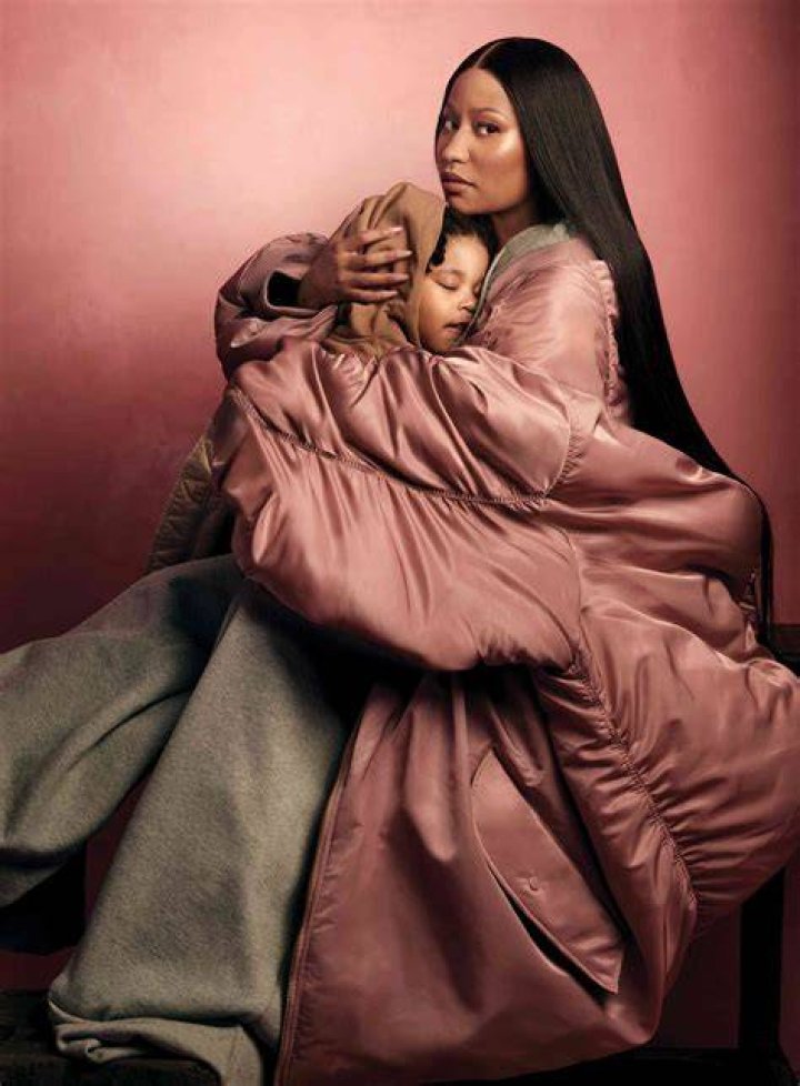 Nicki Minaj cradles ninemonthold son 'Papa Bear' as the duo sport