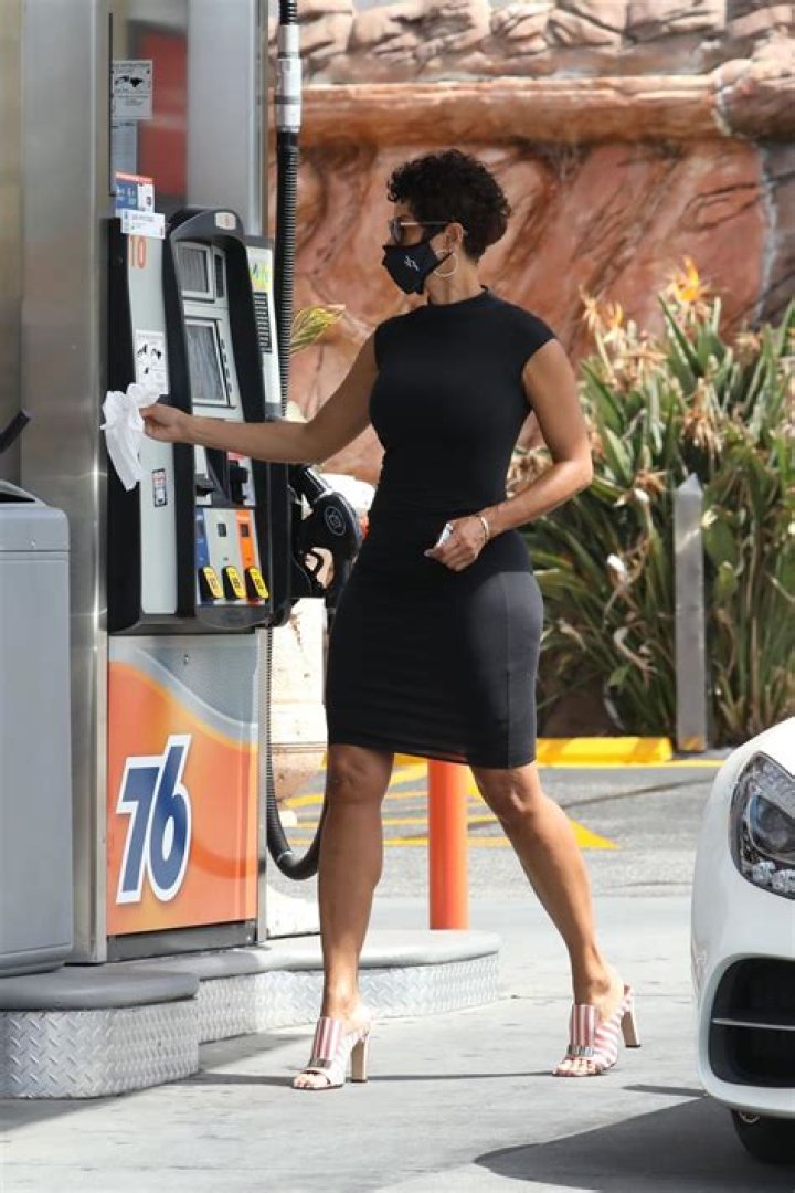 NICOLE MURPHY in a Tight Dress at a Gas Station in West Hollywood 04/10