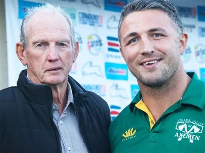 Partner of NRL coach Wayne fires an ominous warning to critics