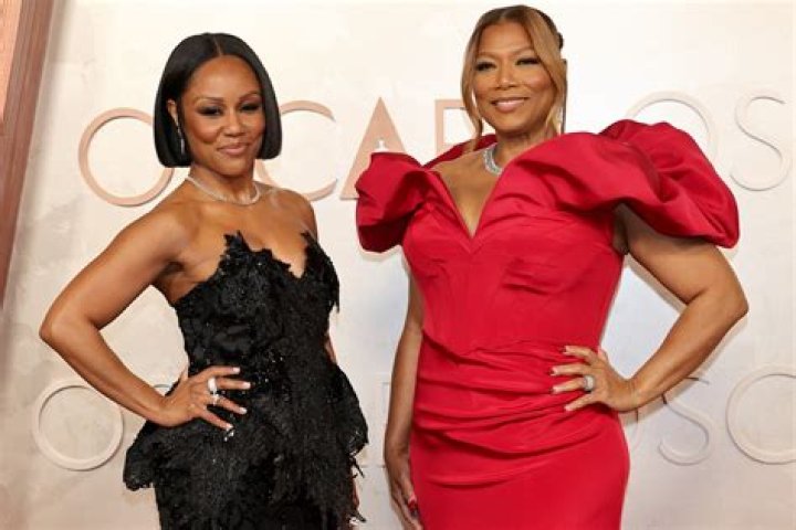 Queen Latifah and partner Eboni Nichols take a leisurely stroll in New