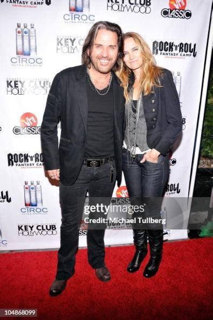 Rock guitarist Kip Winger arrives with wife Paula at the premiere