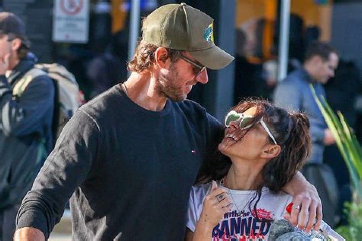 Sarah Shahi and Boyfriend Adam Demos Reunite in Australia
