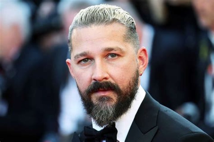 Shia LaBeouf looks excited as he runs on release day for his new movie