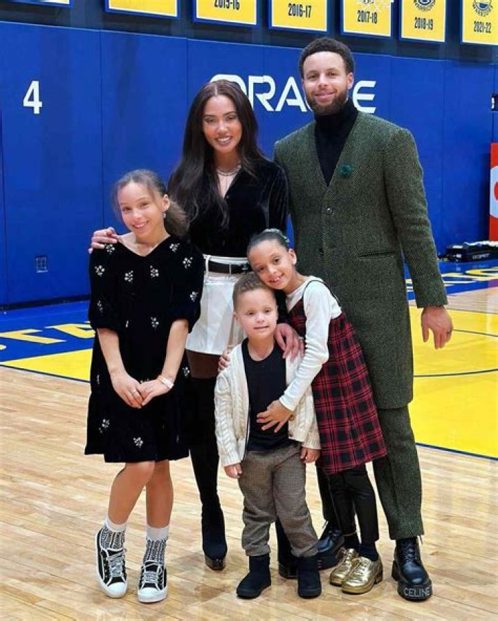 Steph Curry and family pose with championship trophy in adorable photos