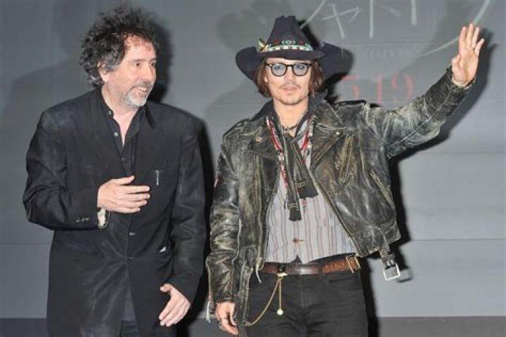 Tim Burton spotted with his arm around Bond Girl Eva Green in London
