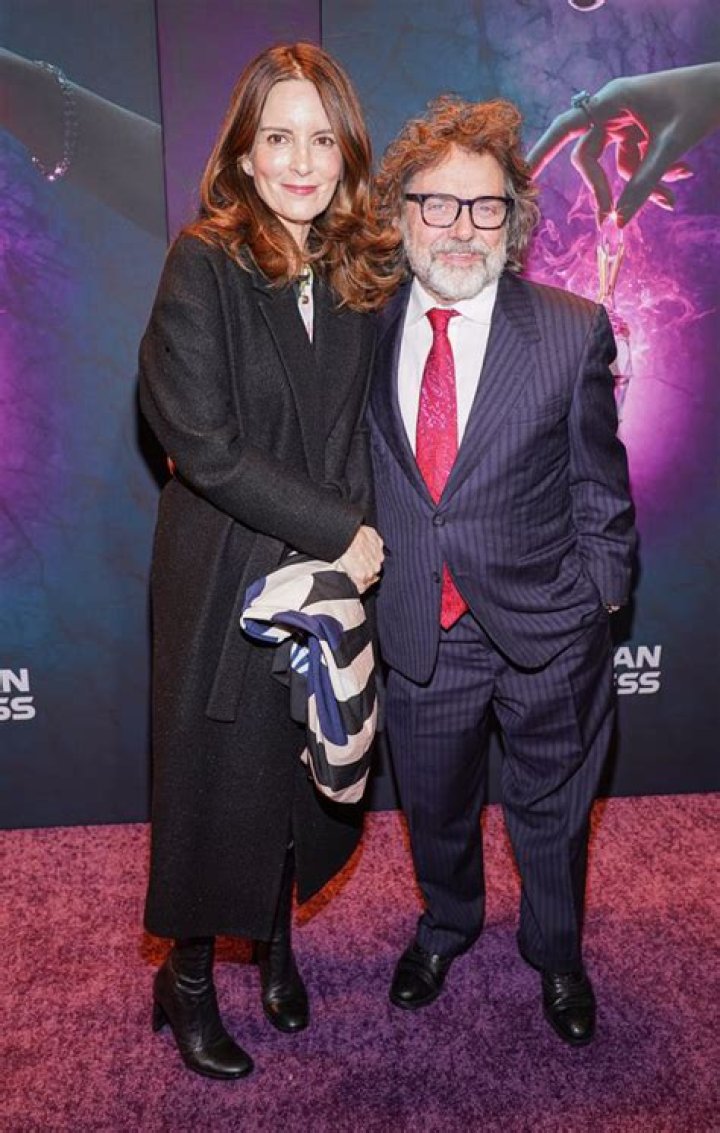 Tina Fey towers over husband Jeff Richmond as she wears stilettos to
