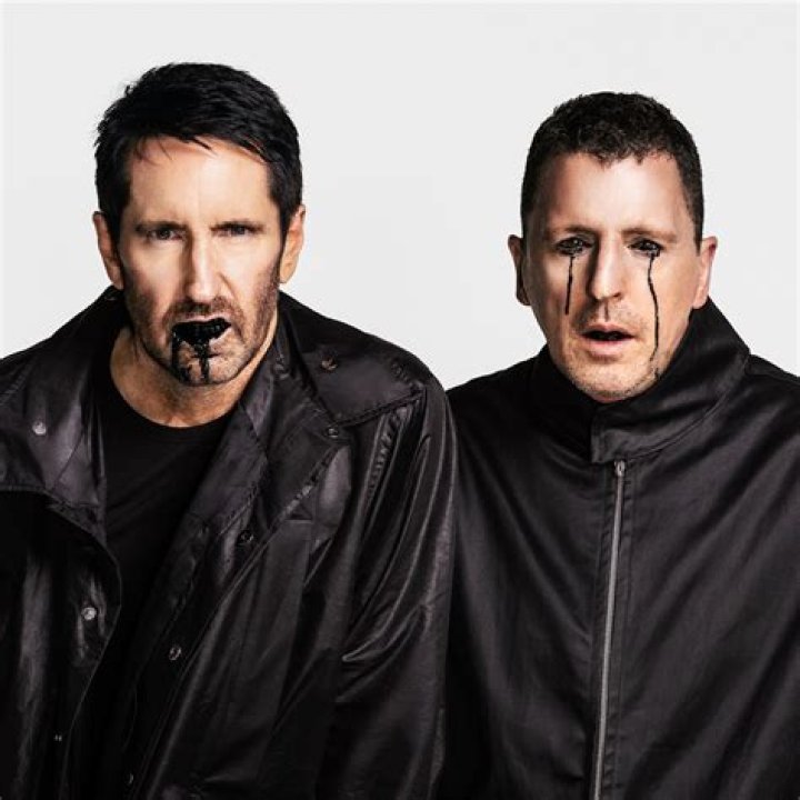 Trent Reznor shows his soft side as he dotes on his sons during family