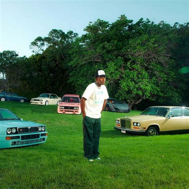 Tyler, the Creator and his mother accept the Best Rap Album award for